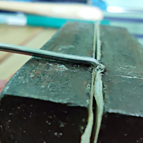 Mei Tan's Bending Wire to A Tight 90-Degree Bend - , General Education, Tools, , Close-up of the hammered wire corner